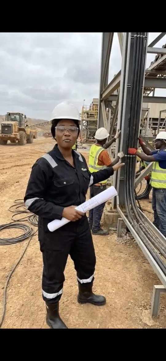 Site engineer with drawings on a cable installation